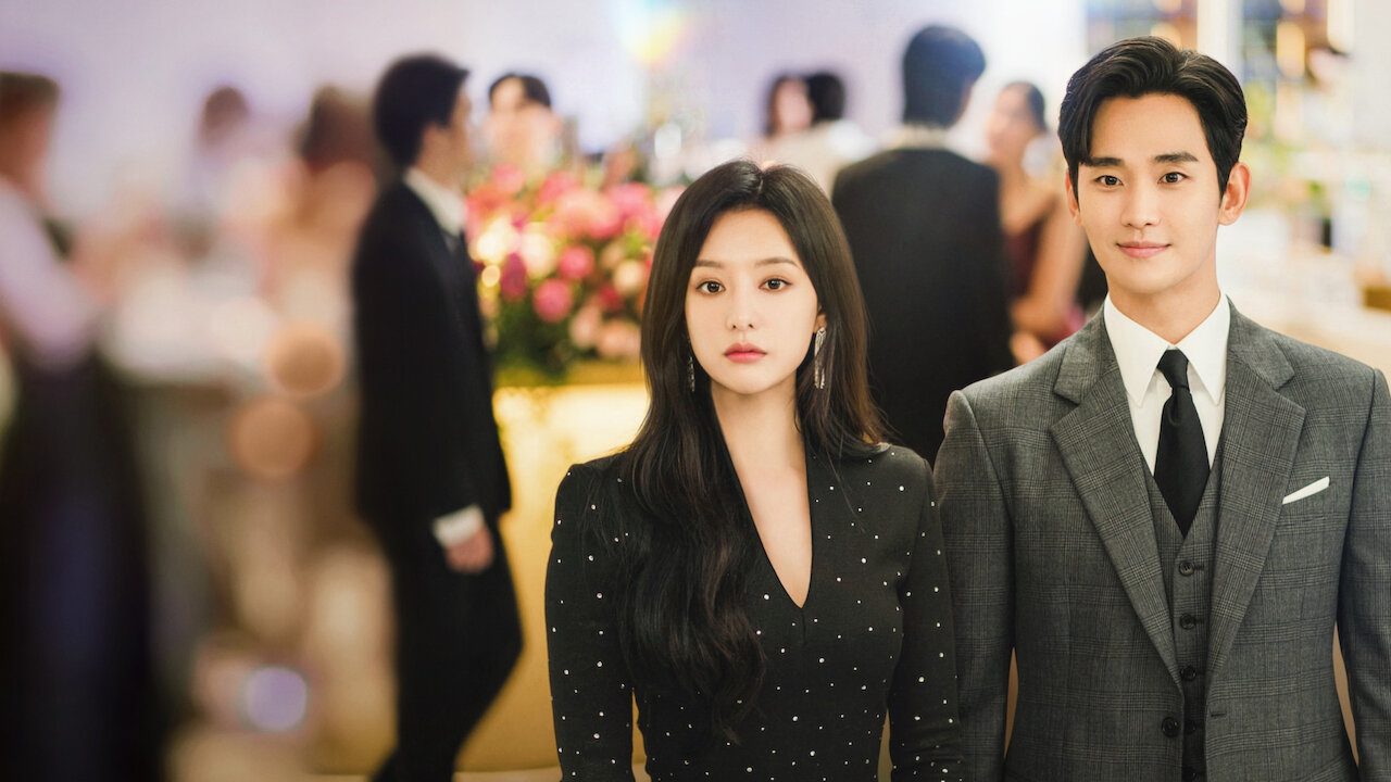 Hong Hae-in e Baek Hyun-woo em evento na imagem oficial de Rainha das Lágrimas